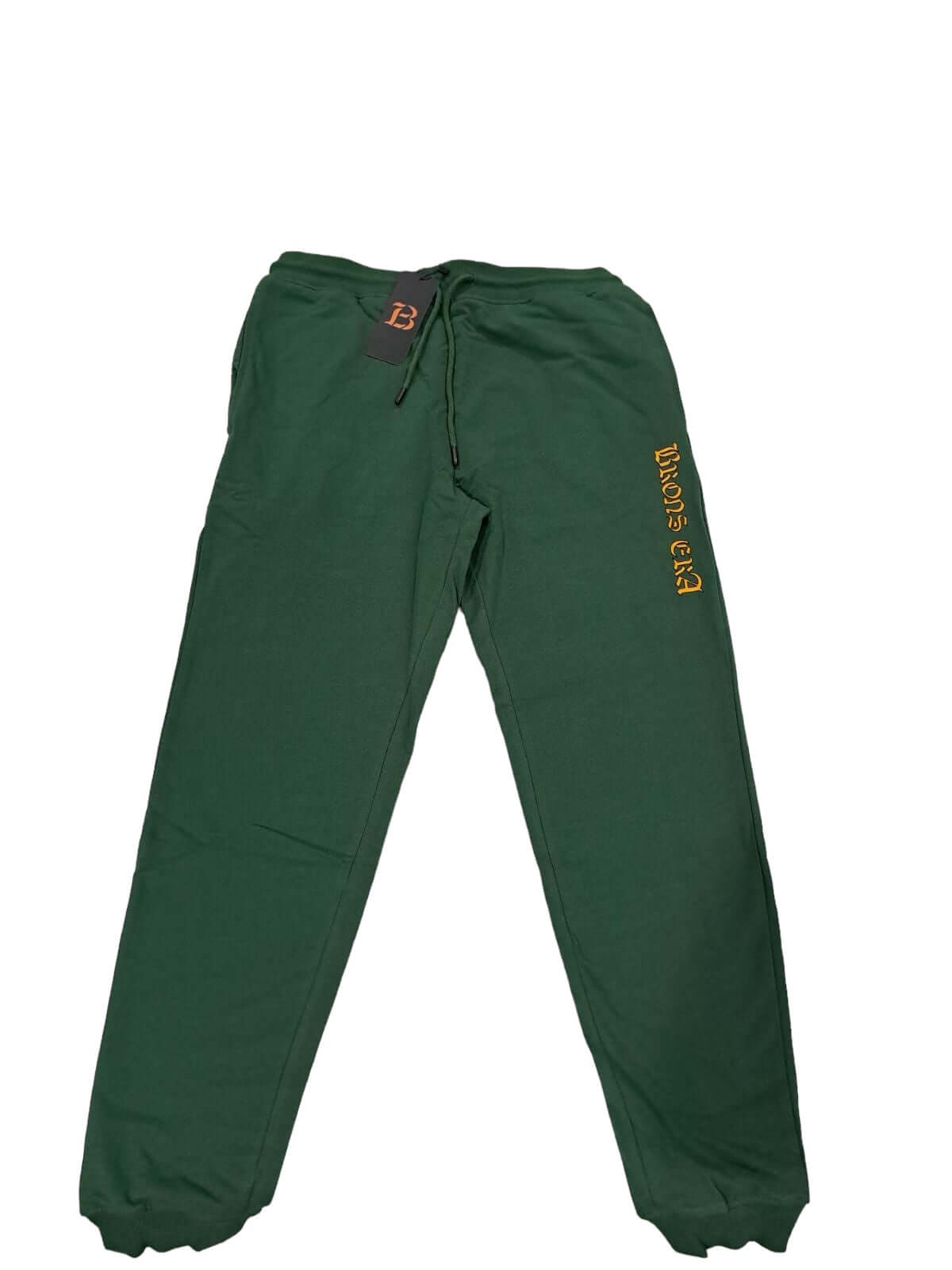 Green organic cotton joggers with relaxed fit, featuring Brons era logo for versatile styling and quality comfort.